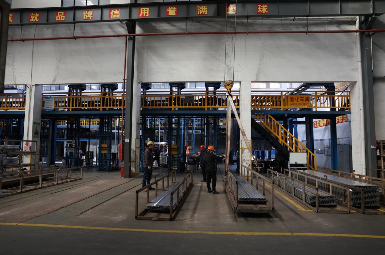 The anodising line — profiles through the oxidation bath