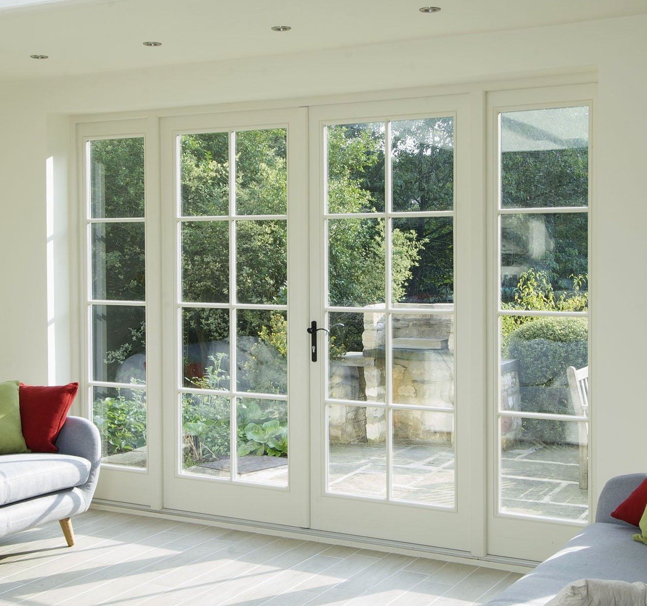 French door configuration with acoustic glazing overlooking a garden
