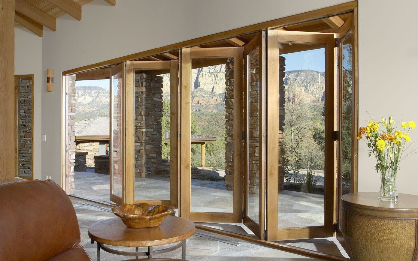 Timber folding doors inside a bright cyclone-rated room