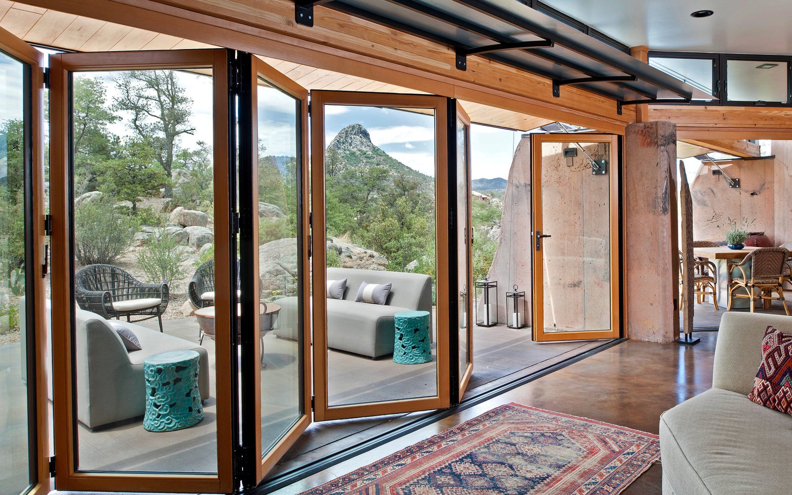 Open timber-framed glass wall in a bright cyclone-rated interior