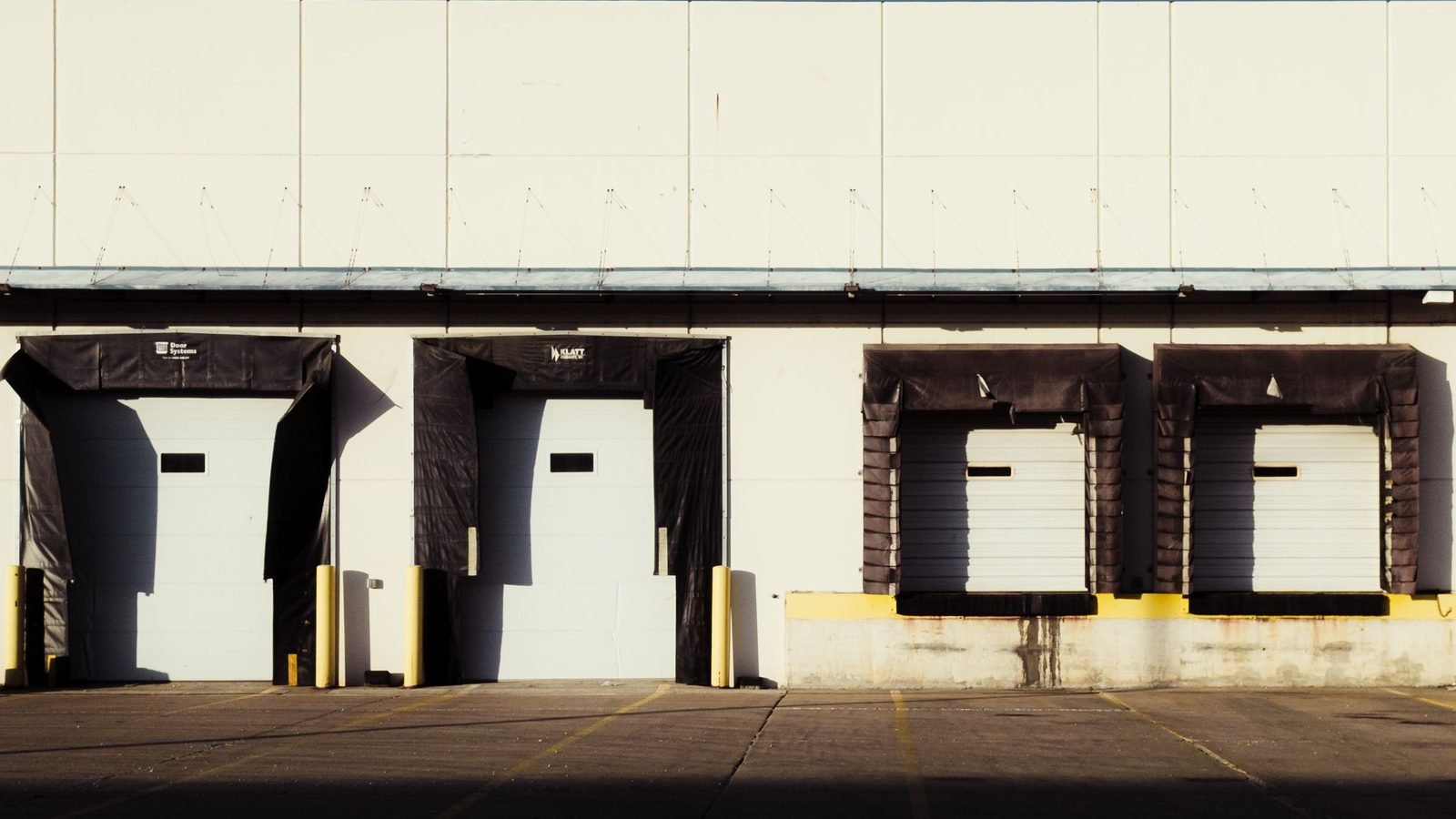 Loading docks on a distribution warehouse, sealed and ready for a container
